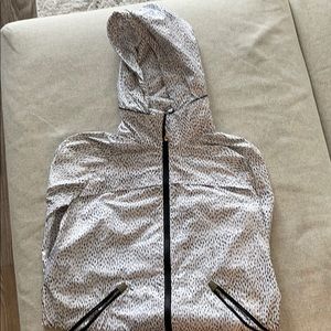 Lululemon rain jacket with gold accents